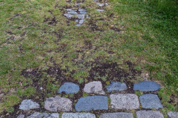 the-cobbles-extend-under-the-grass